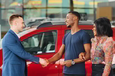 A young couple purchases their first car